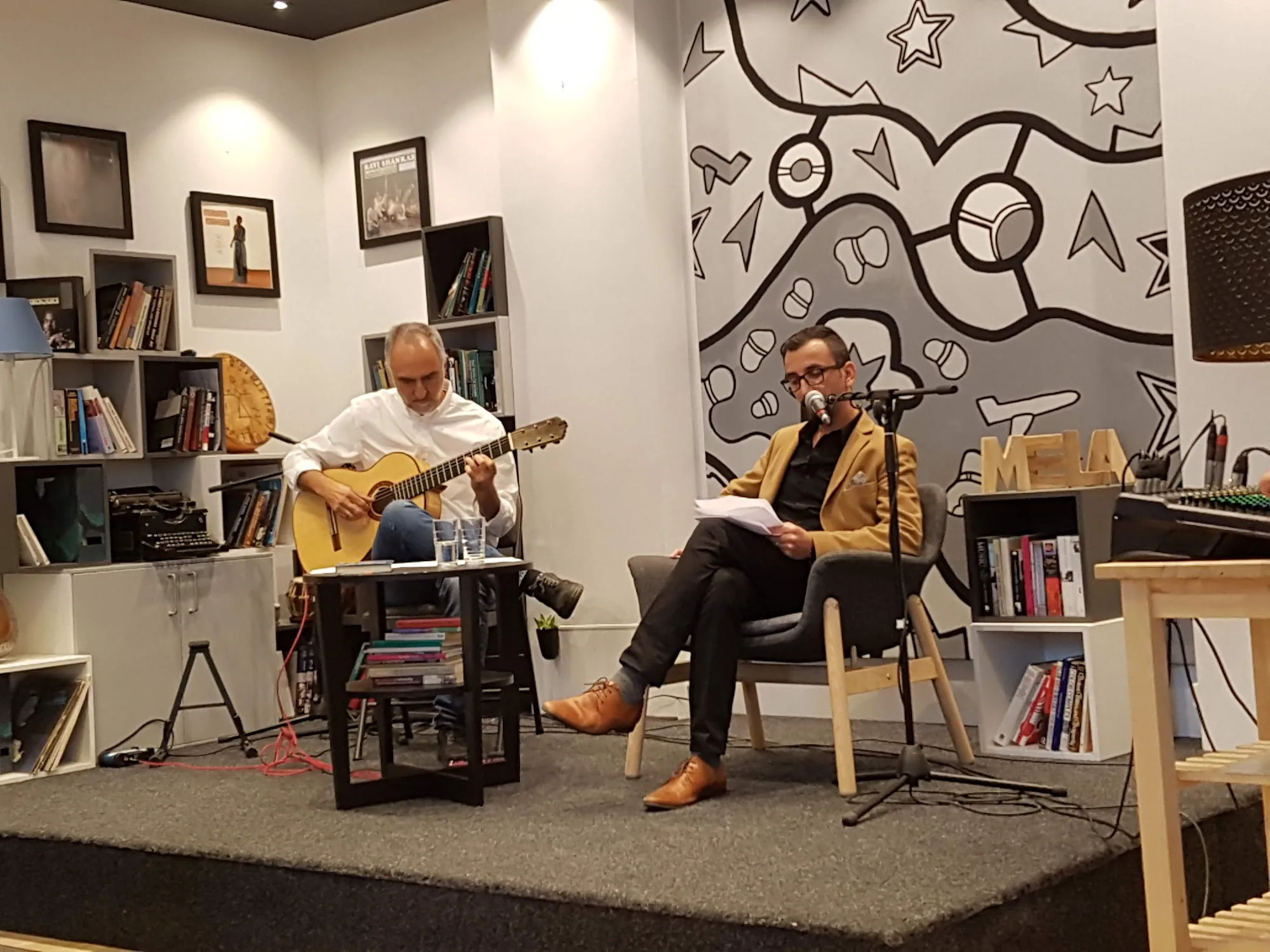 Two performers on stage under spotlights at Melahuset Oslo Norway