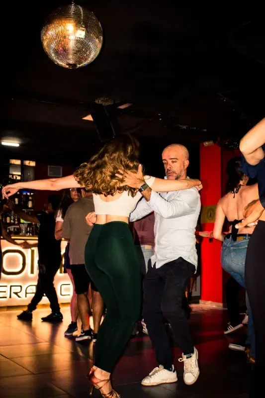 Couple dancing under disco ball at Holo Canteras Club, Las Palmas