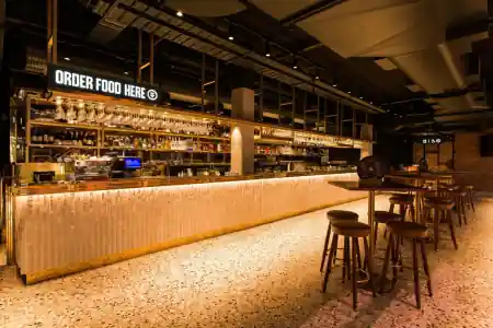 Pig N Whistle Fortitude Valley bar interior with illuminated counter and seating in Brisbane — salsa, bachata venue in Brisbane