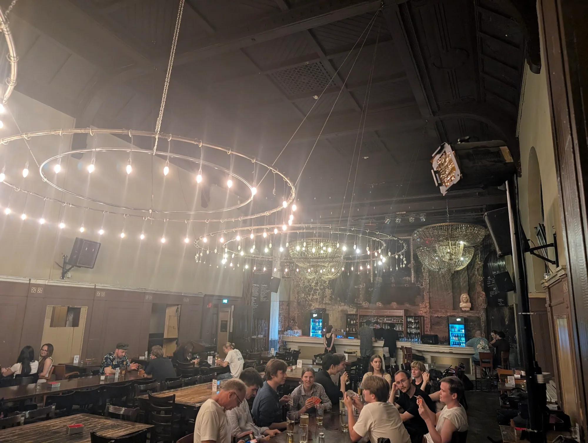 Beyerhaus venue interior at night with crowd and chandeliers