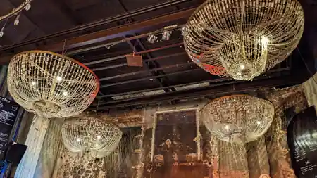 Beyerhaus ornate chandelier installation in venue interior — bachata venue in Leipzig