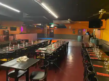 Interior dance floor and seating area at La Pachanga salsa club in Paris