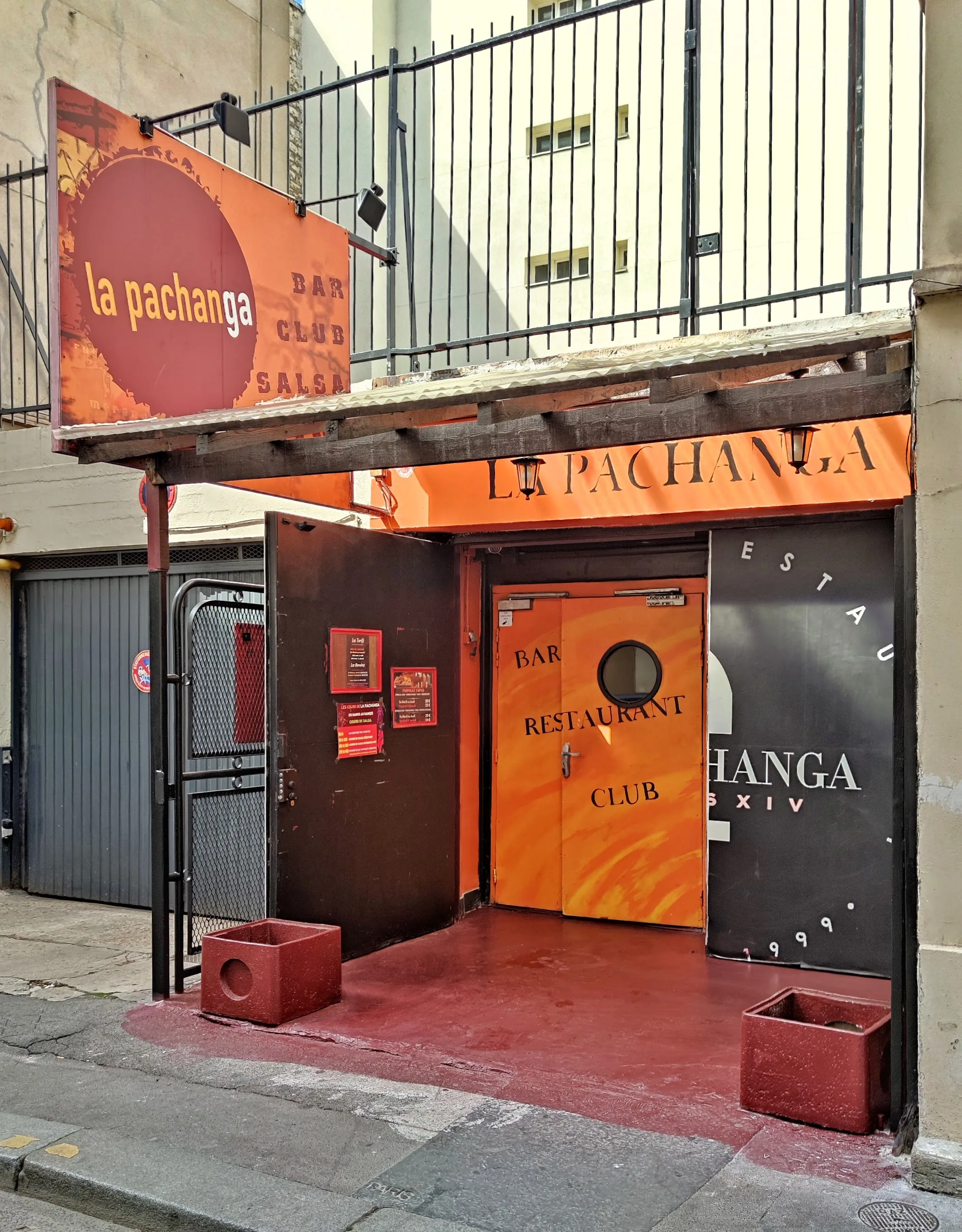Branded entrance and signage of La Pachanga Bar Club Salsa in Paris