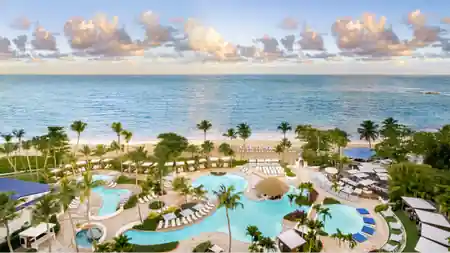 Aerial pool and beach view at Fairmont El San Juan Hotel Puerto Rico, salsa venue in Carolina