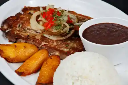 Tortugas Cuban Grill bar and lounge area with colorful tropical atmosphere — salsa, bachata venue in Atlanta