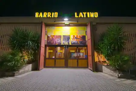 Barrio Latino Roma interior with festive lighting and Latin dance atmosphere — salsa, bachata venue in Rome