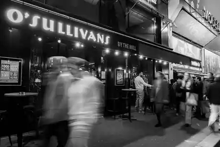 O'Sullivans By The Mill dance floor in Pigalle Paris with lively crowd — salsa venue in Paris
