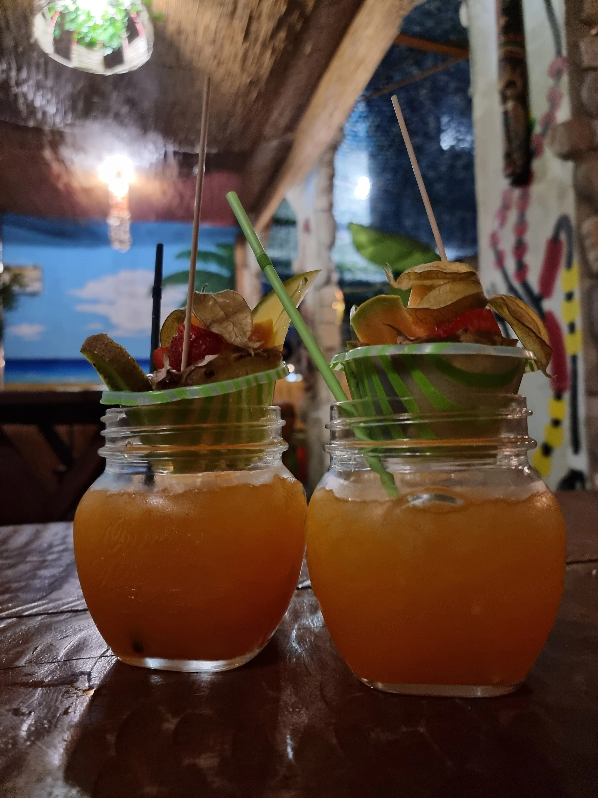 Tropical mural wall and cocktails at Dandarì Disco Pub in Villanova di Castenaso Italy