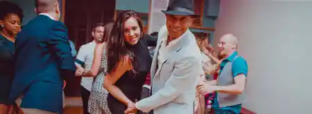 Couple dancing salsa at Casa Mestiza dance night in Vienna