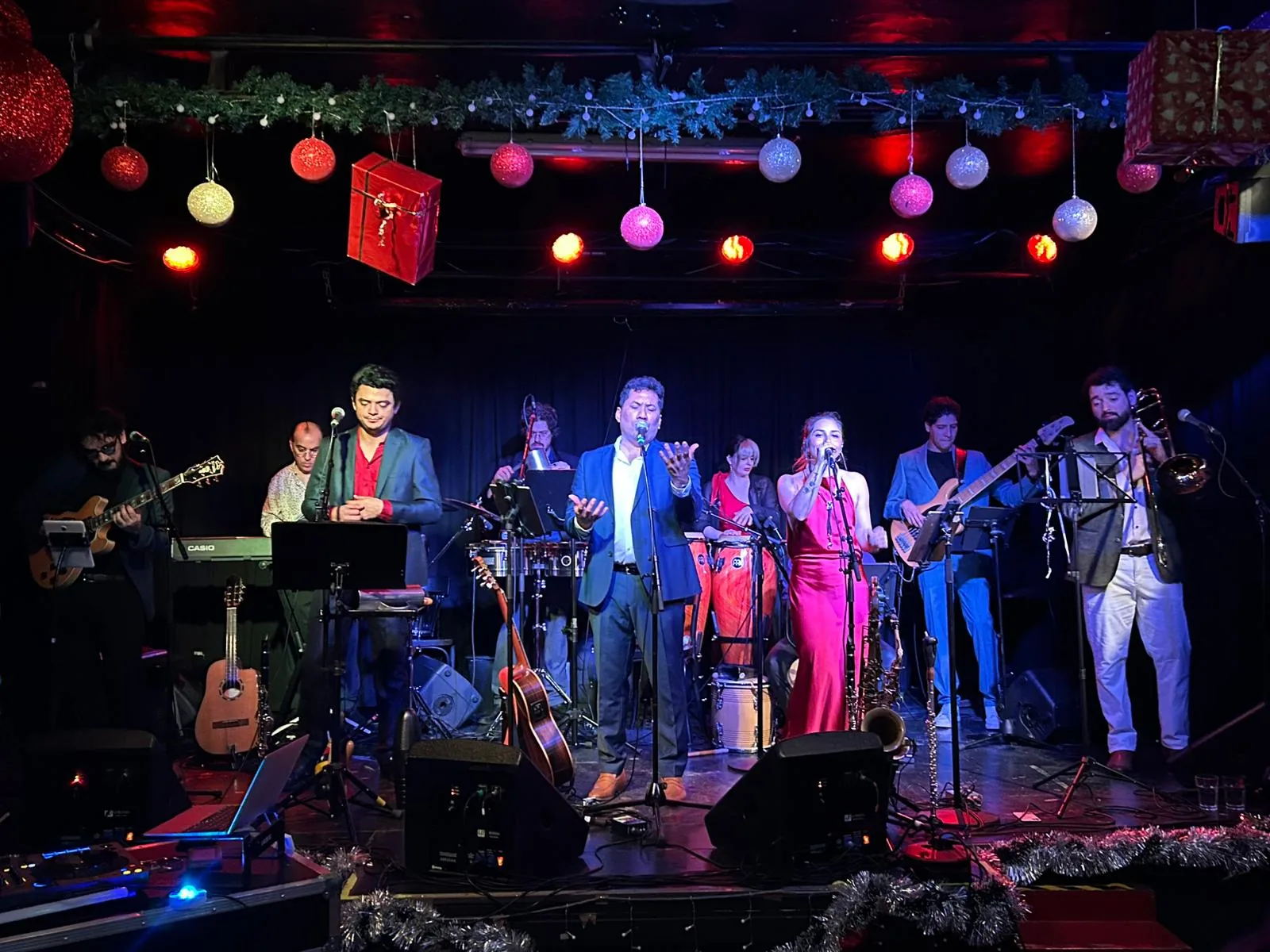 Live Latin band performing on stage at Casa Mestiza Vienna Christmas event