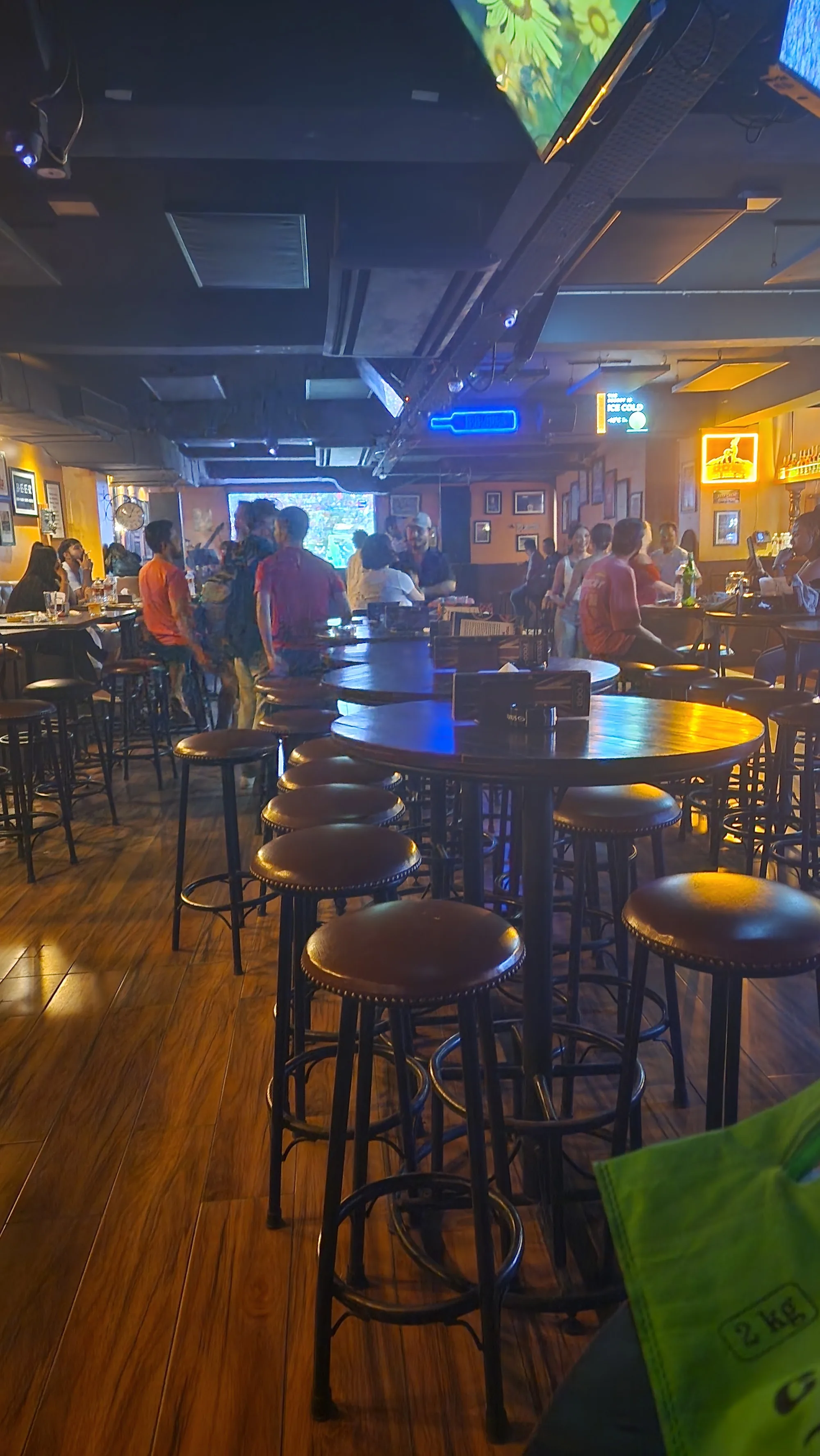 London Pub Kathmandu interior with crowd of people socialising at the bar area