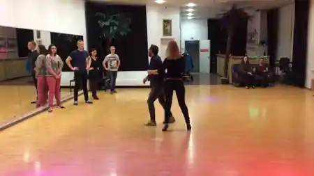 Salsa class practicing on the wooden dance floor at Salsa Club Munich