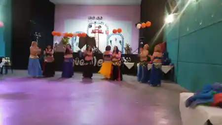 Group performance on stage at Sala Aguanile in Cordoba — salsa, bachata, kizomba venue in Córdoba