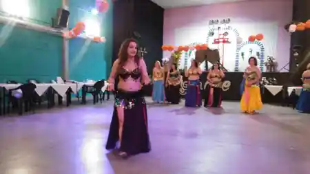 Solo dancer with troupe at Sala Aguanile dance hall in Cordoba — salsa, bachata, kizomba venue in Córdoba