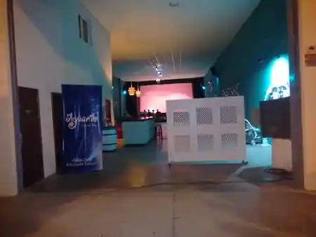 Sala Aguanile entrance with branded banner and bar in Cordoba — salsa, bachata, kizomba venue in Córdoba