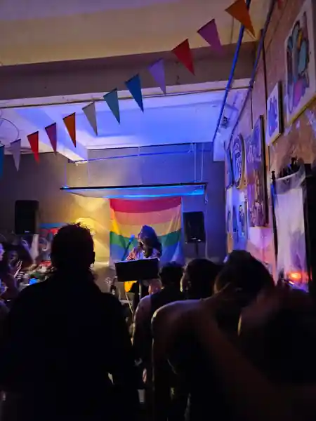 DJ and party crowd with blue lighting at Espaço Cultural Jubilant Porto Portugal — bachata, salsa venue in Porto