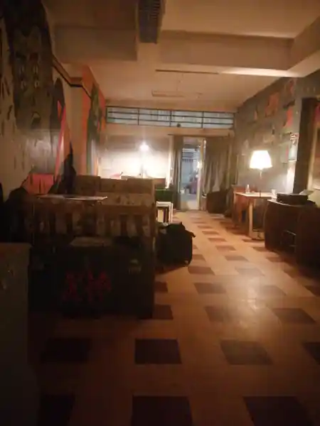 Dark venue interior with colorful murals at Espaço Cultural Jubilant Porto Portugal — bachata, salsa venue in Porto