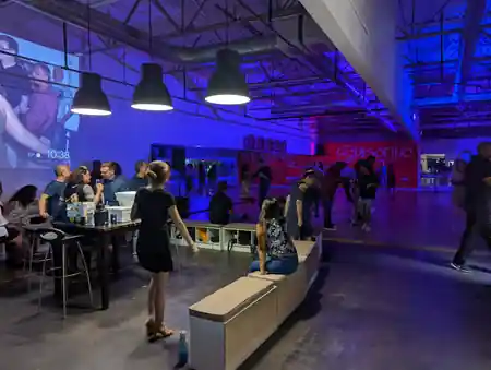 Social-night atmosphere at Pasofino Dance Atlanta with branded wall and lounge seating — salsa venue in Atlanta