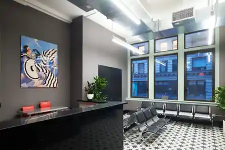 Reception lobby with star-tile floor at the YSBD studios hosting Candela Fridays in New York, salsa venue in New York