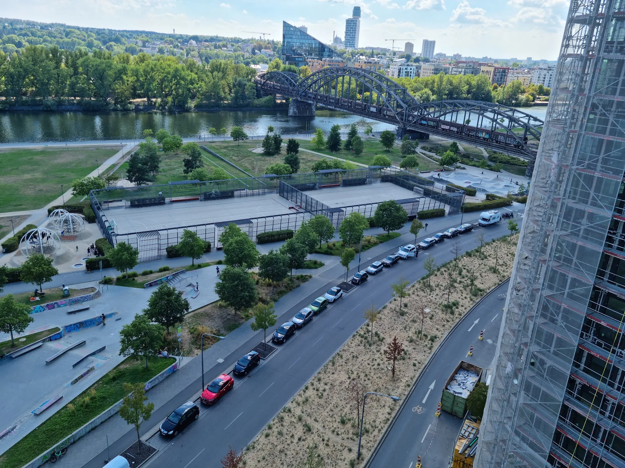 Aerial view of Hafenpark Frankfurt showing the outdoor event space structure by the river