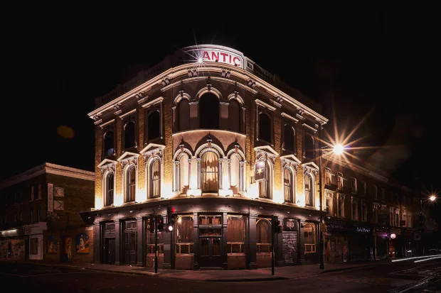 Dogstar Brixton full building facade illuminated at night showing ornate Victorian architecture on Coldharbour Lane