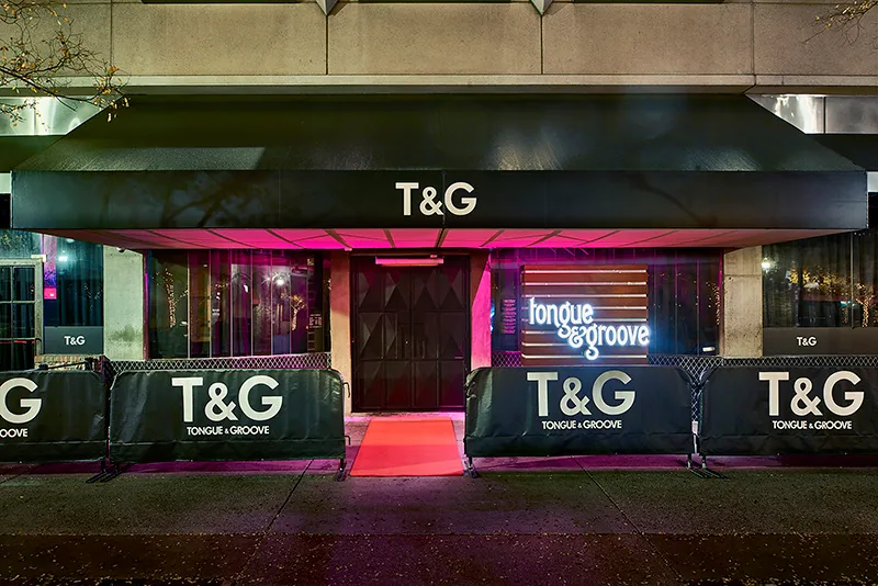 Tongue and Groove Atlanta nightclub entrance with red carpet at night