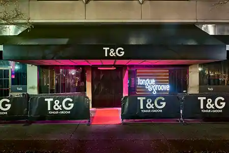 Tongue and Groove Atlanta nightclub entrance with red carpet at night, salsa, bachata venue in Atlanta