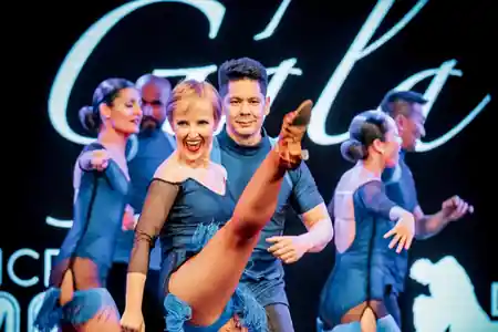 Salsa performers on stage during a gala event at Dance Mambo Ultimo Sydney
