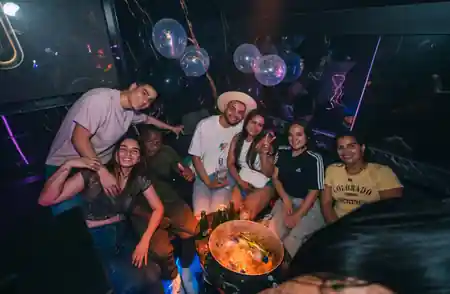 Party night at OUT Latin Club Amsterdam with colorful lighting — bachata, salsa venue in Amsterdam