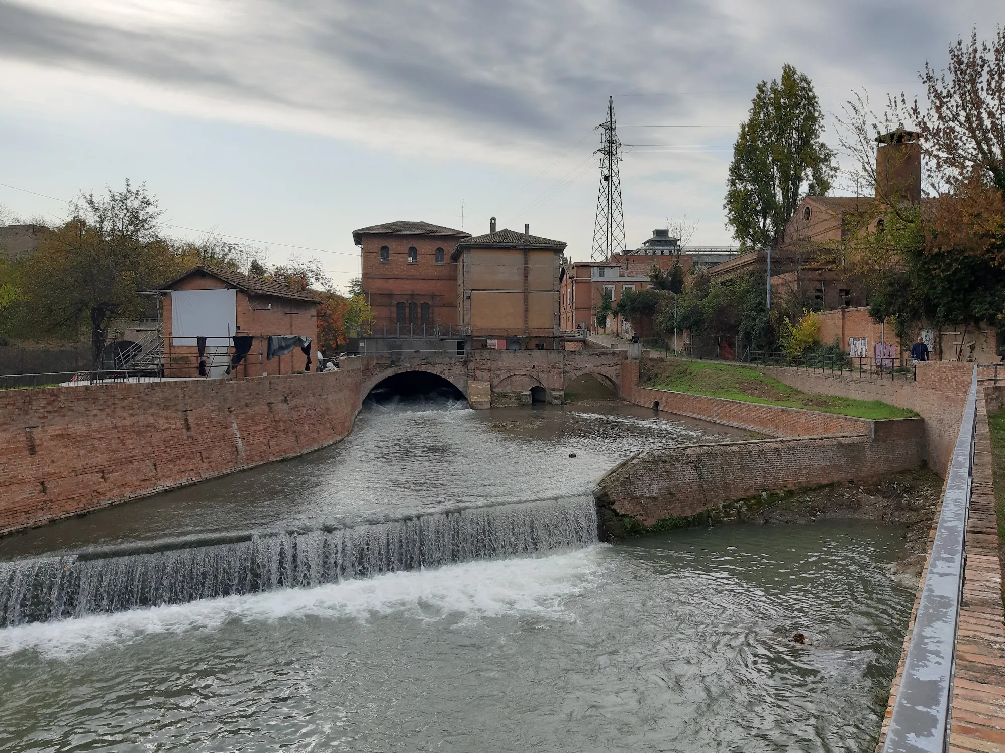 Battiferro autumn canal exterior with string lights and crowd