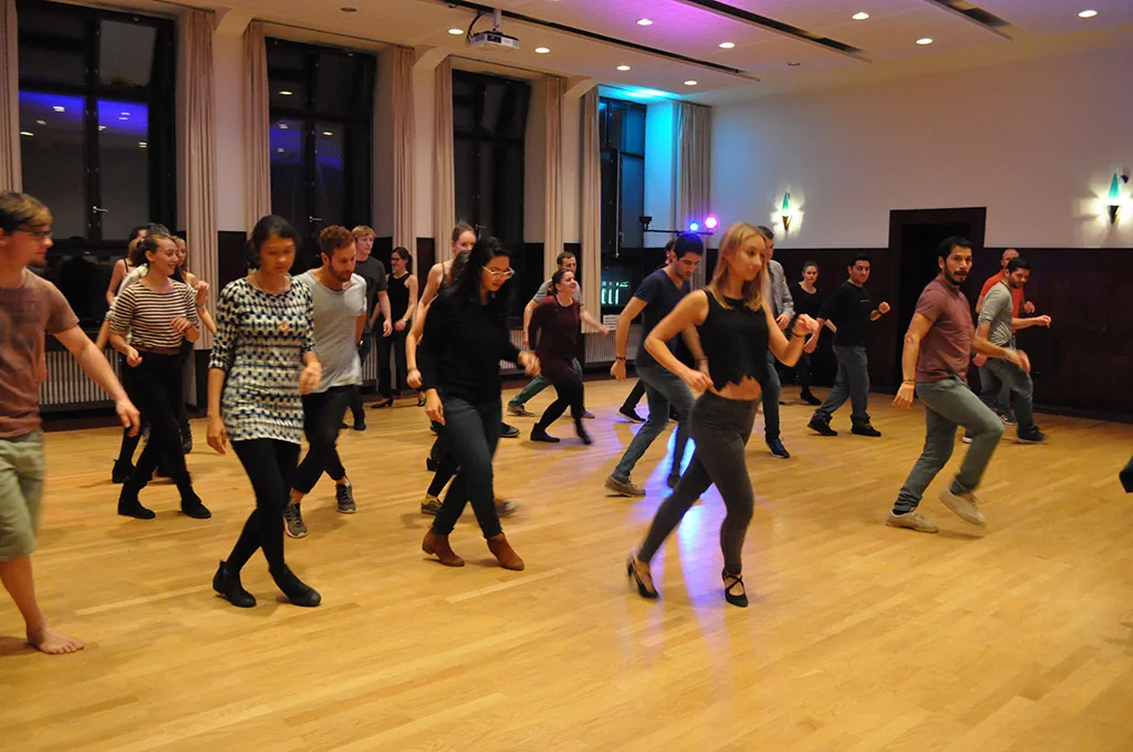 Salsa workshop dancers on the wooden floor at El Templo Heidelberg