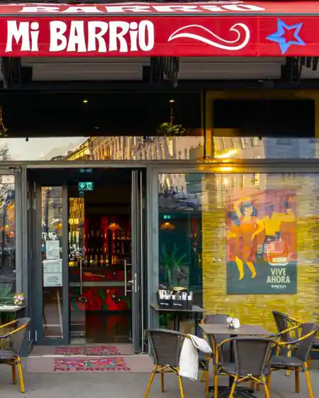 MI Barrio venue exterior with branded red signage in Vienna — bachata venue in Vienna