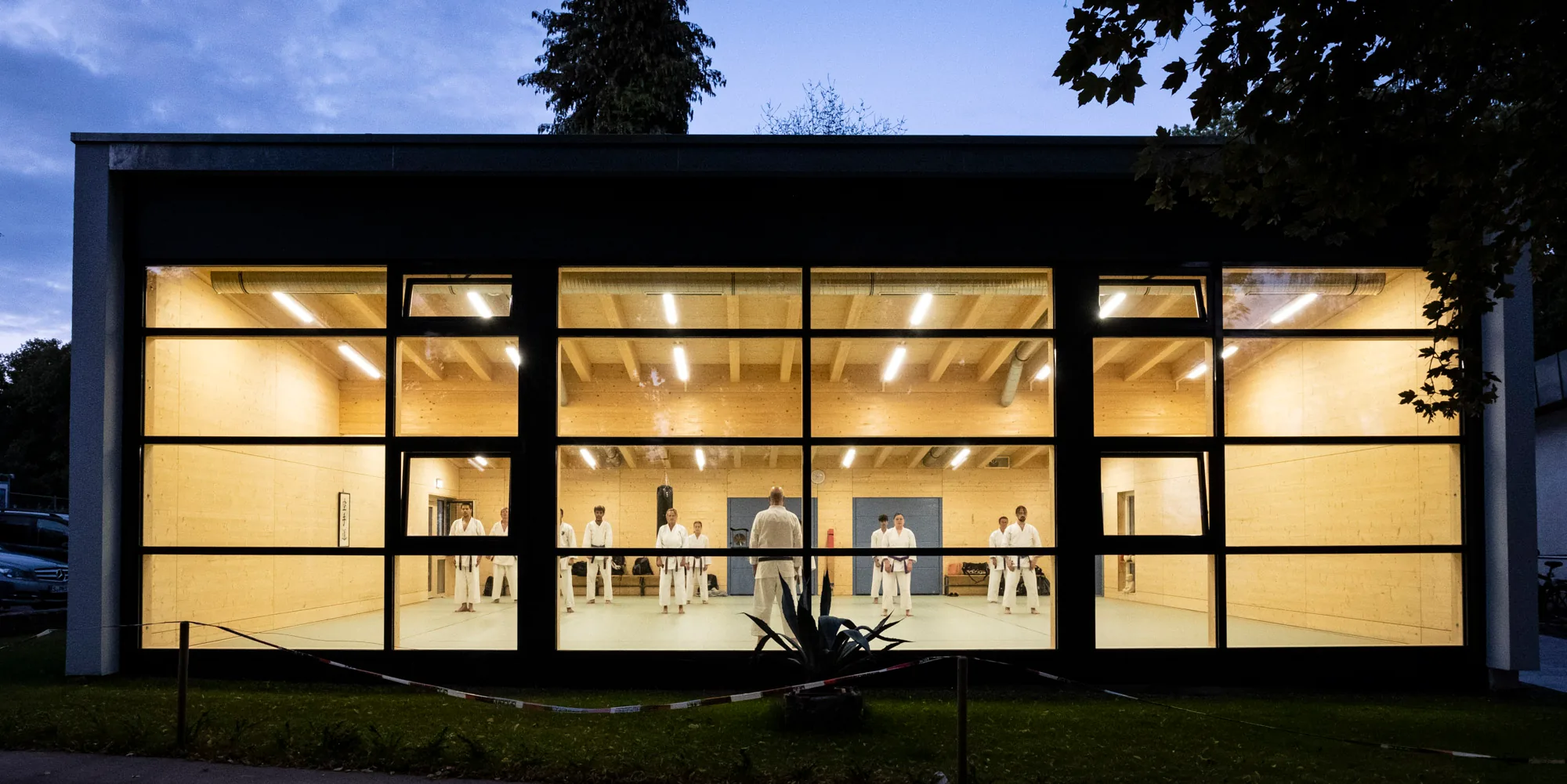 Modern glass and steel building exterior of TSG-Stuttgart e.V. sports venue