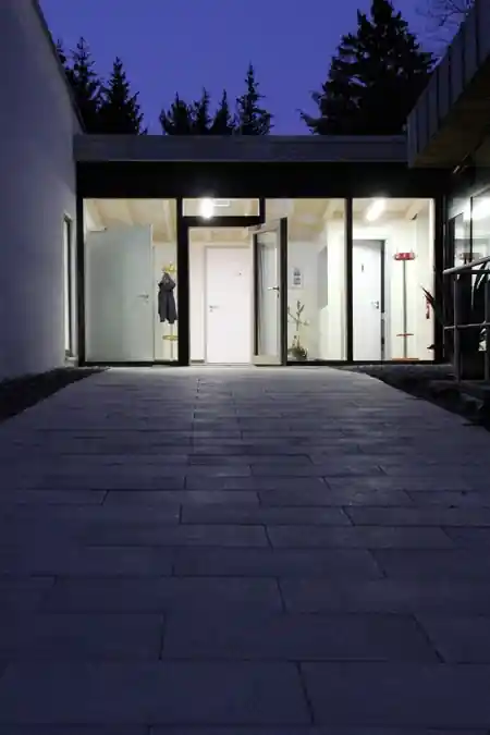 TSG Stuttgart sports complex building exterior illuminated at night — kizomba venue in Stuttgart