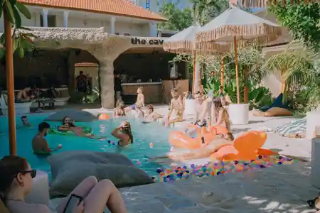 Pool party crowd at the Cave bar at Mad Monkey Uluwatu, Bali, bachata venue in Bali