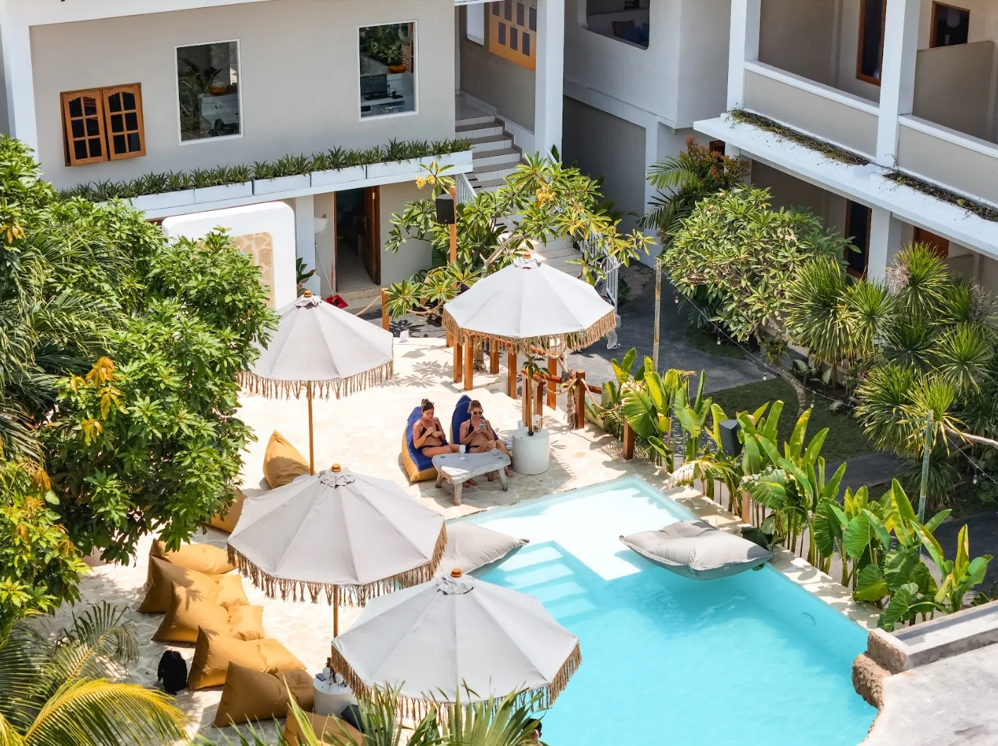Aerial view of pool and courtyard at Mad Monkey Uluwatu, Bali