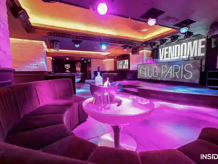 Vendome Club Paris dance floor and lounge area with atmospheric lighting — salsa venue in Paris