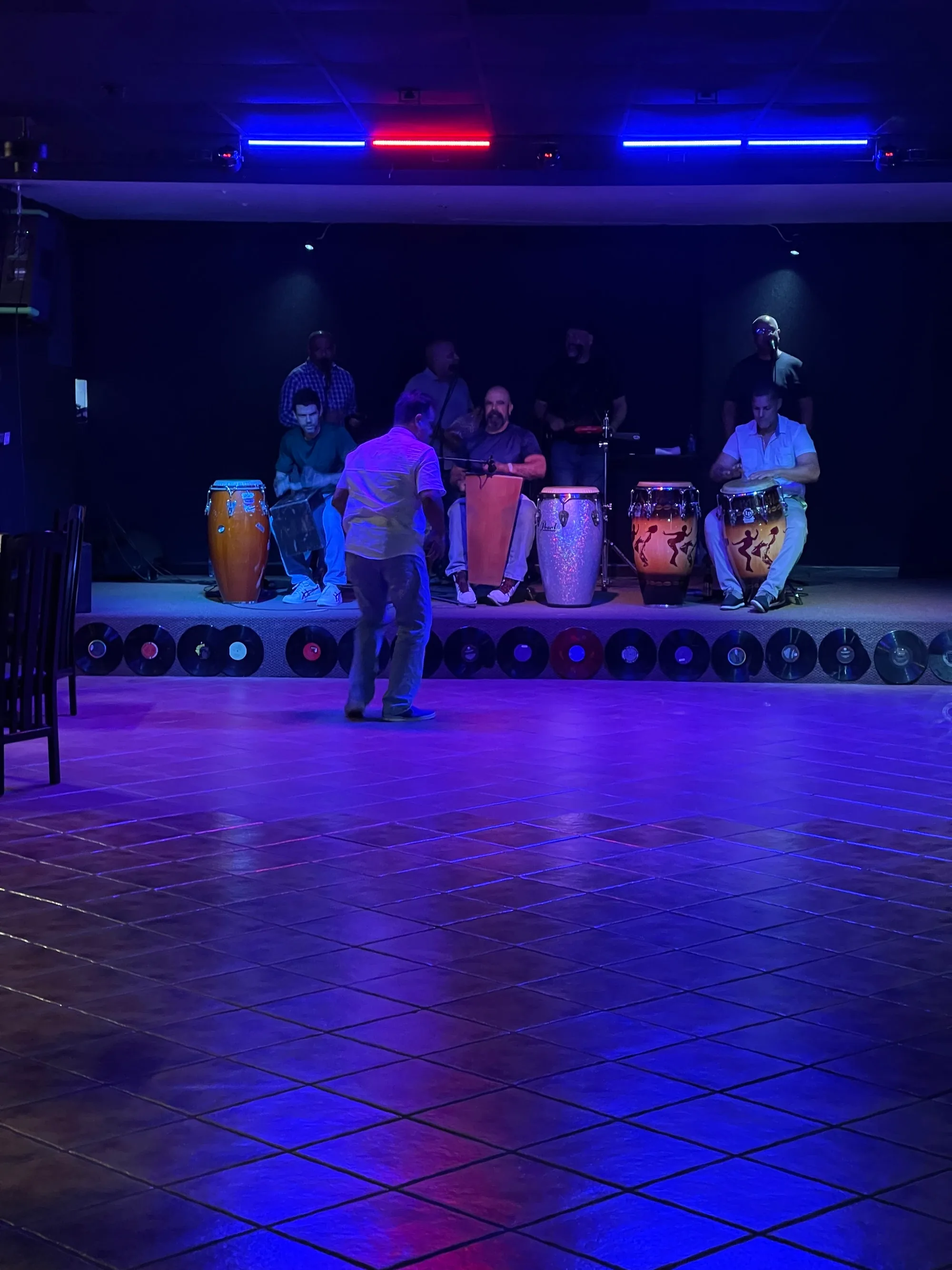 Empty dance floor and conga band on stage at Música Bar Lounge San Juan