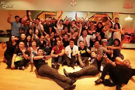Group photo of the salsa dance community after a social at The Mambo Outlet in Los Angeles