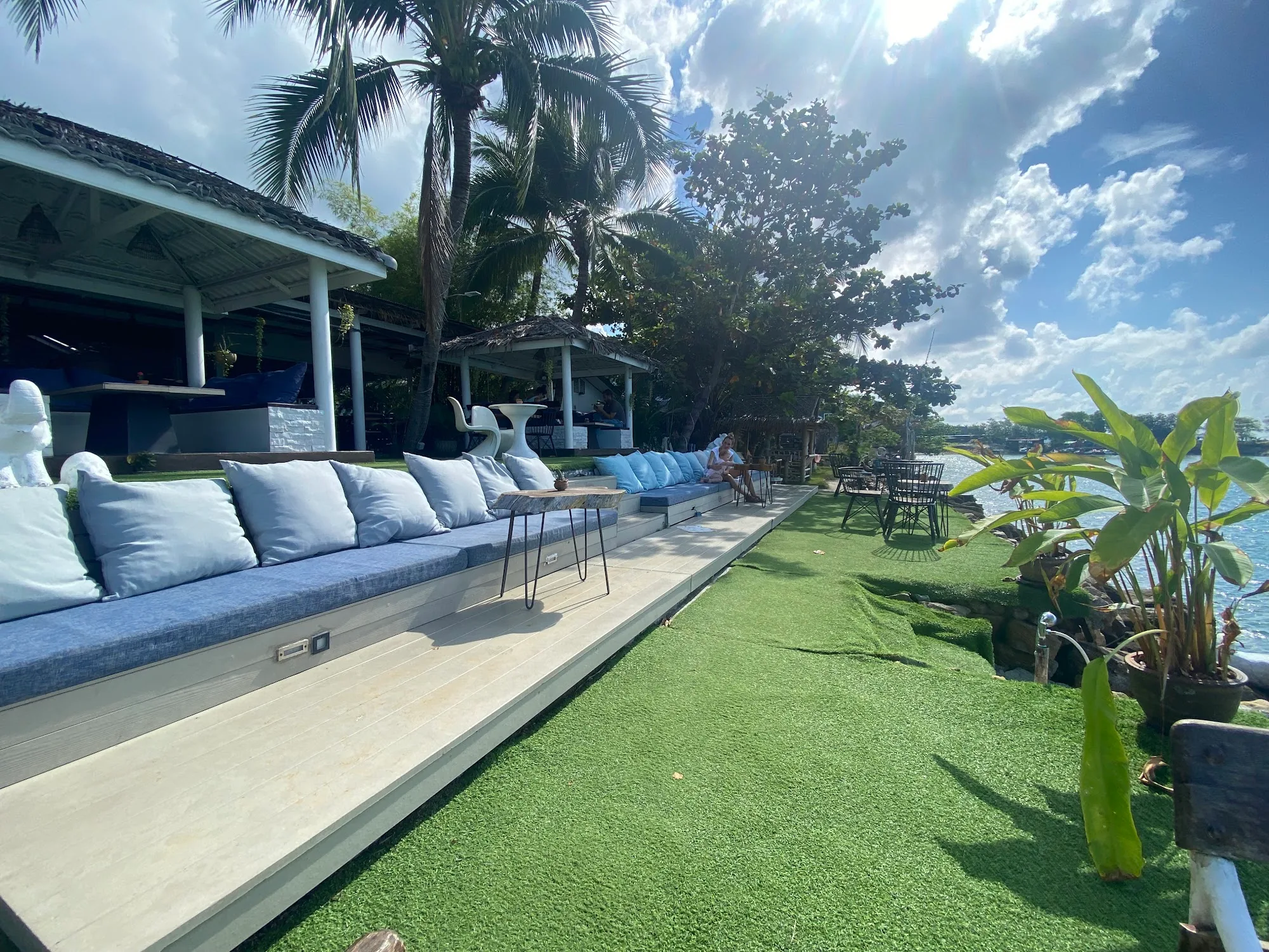 Outdoor lounge seating at La Casa Tropicana in Koh Phangan, Thailand
