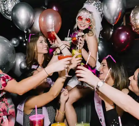 Guests celebrating with drinks and balloons at a party inside K. Pacho New York — salsa, bachata venue in New York