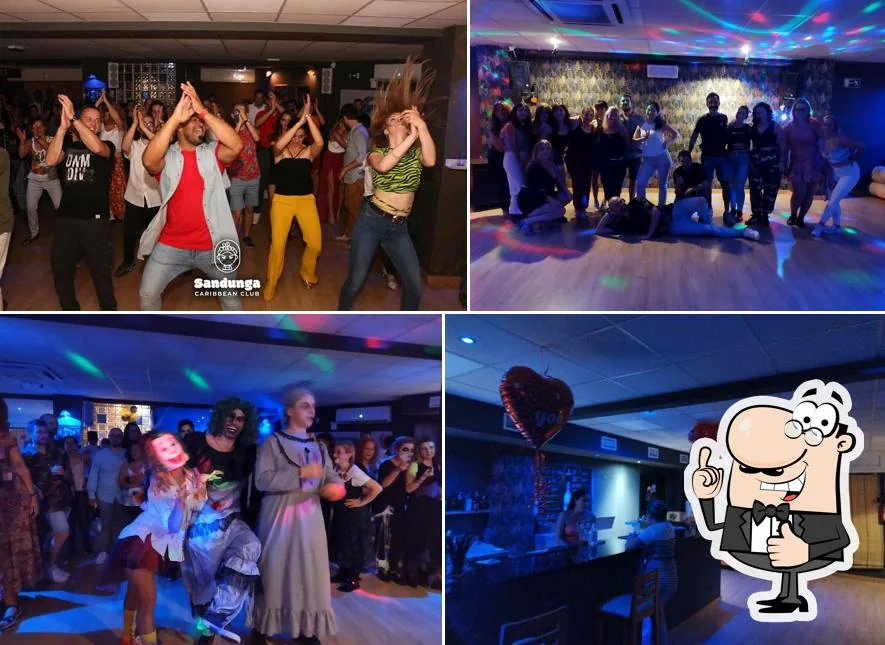 Salsa dance class and social dancing at Sandunga Caribbean Club in Malaga with dancers on the floor