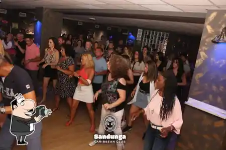 Dancers enjoying a salsa and bachata social night at Sandunga Caribbean Club in Malaga
