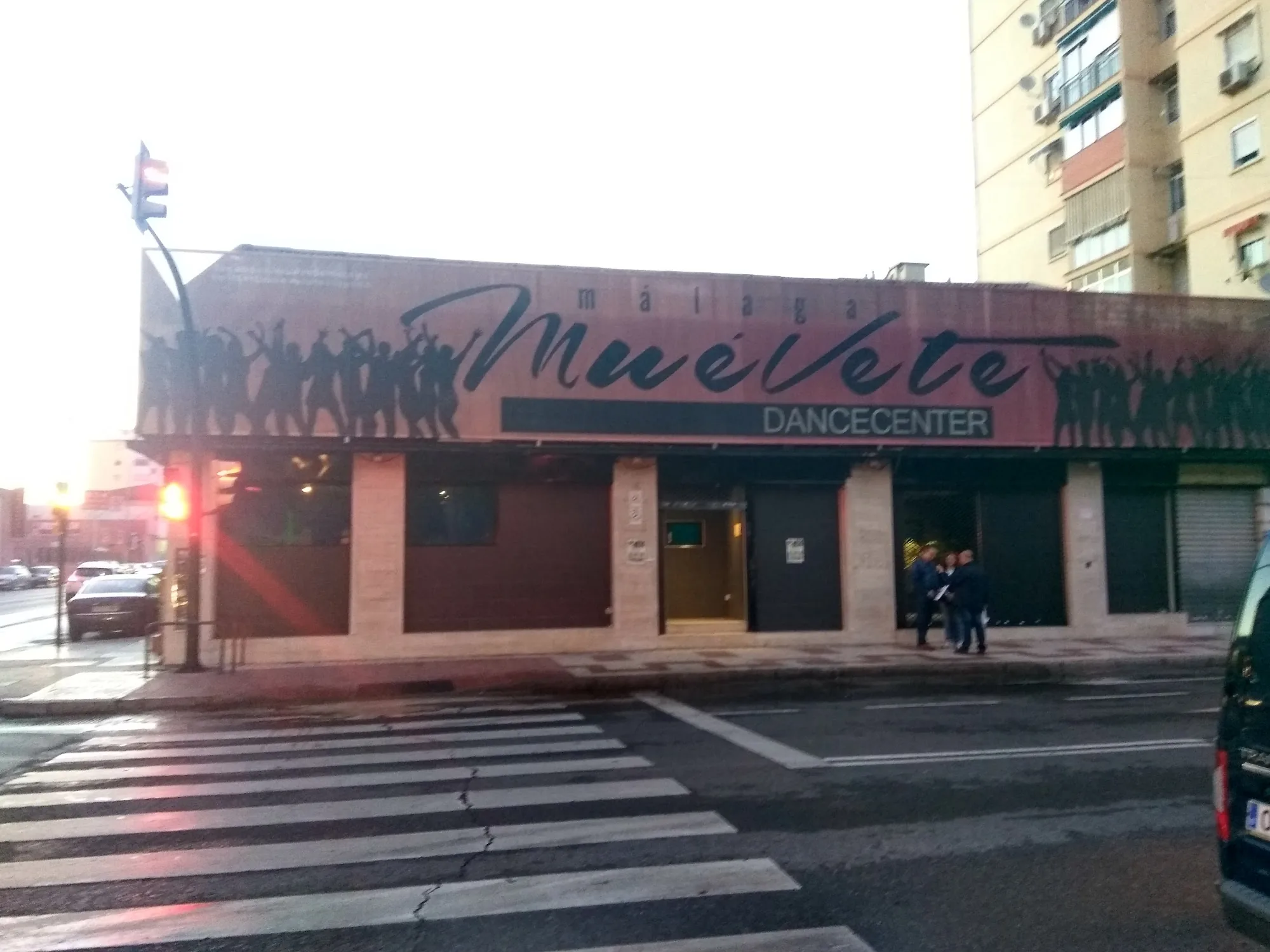 Exterior entrance of Sala Muévete Dance Center with branded signage in Málaga