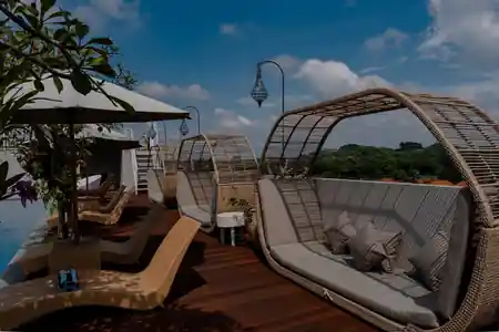 MaxOneHotel Ubud rooftop swimming pool with tropical garden views in Bali — zouk venue in Bali