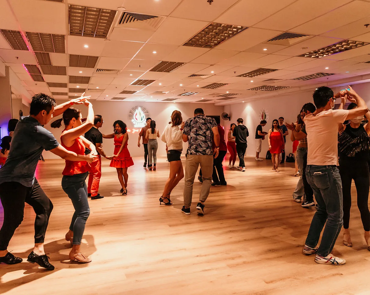 Midland House, Singapore – social dance night with couples dancing salsa and bachata on the dance floor