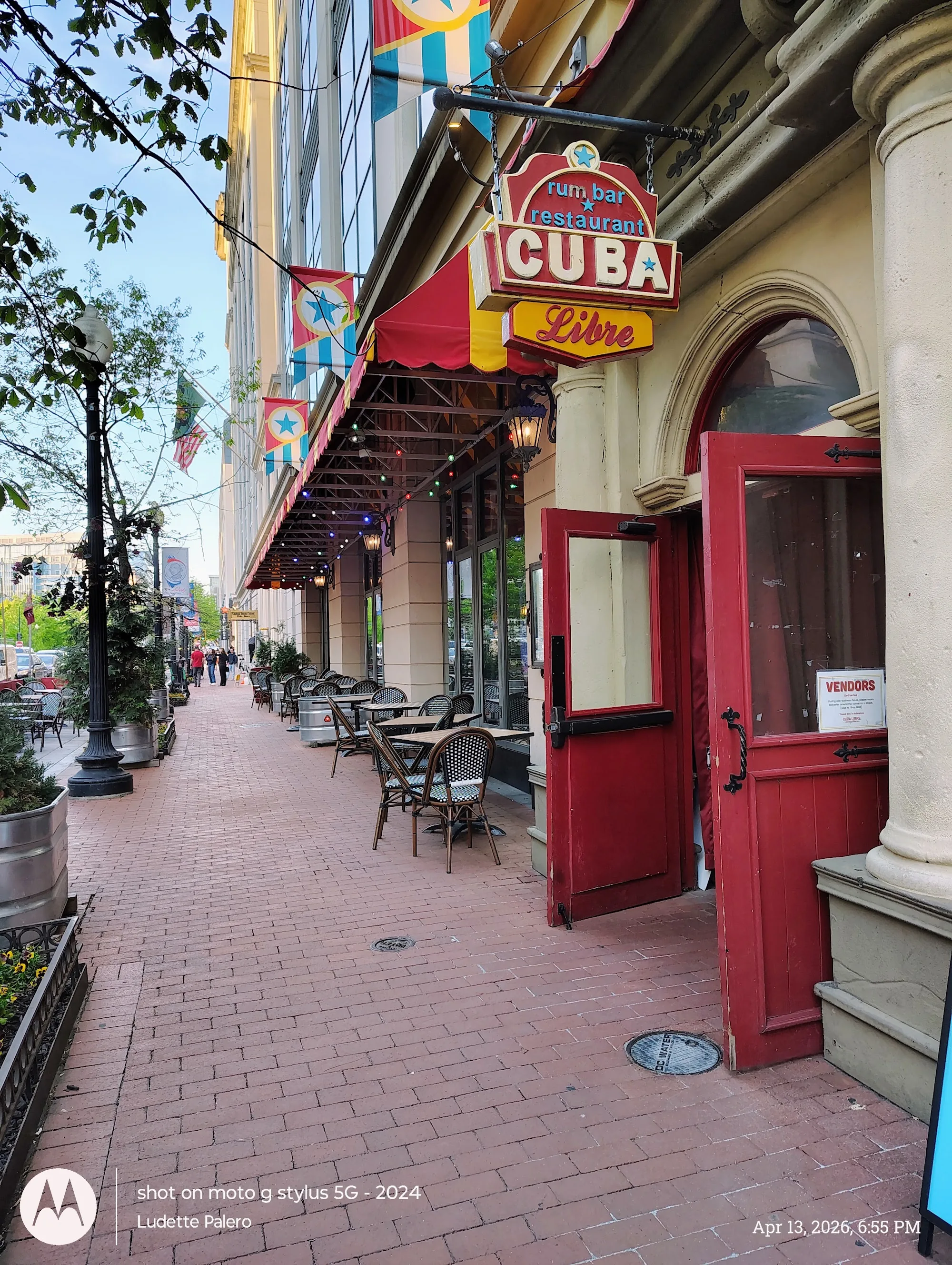 Branded street entrance and red awning of Cuba Libre Restaurant & Rum Bar in Washington, D.C.