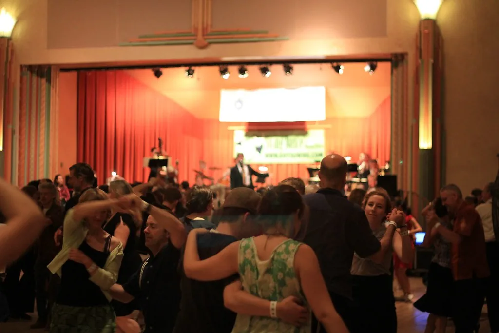 Social dancers enjoying a live music dance night in the Spanish Ballroom at Glen Echo Park in Washington D.C.