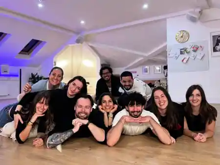 Beyond Dance Dublin group of dancers posing on studio floor — bachata, kizomba venue in Dublin