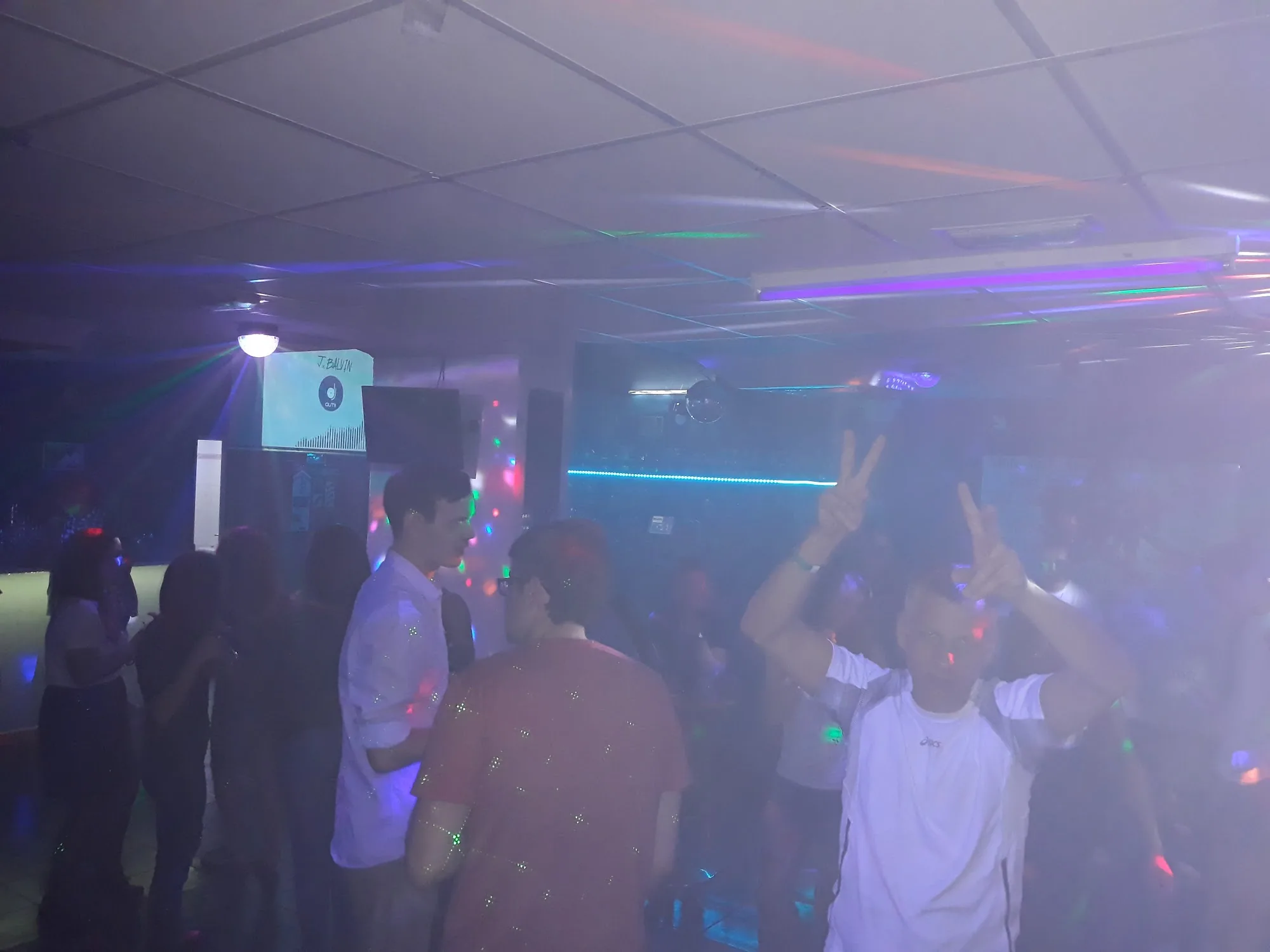 Dance floor crowd under disco lights at Disco Star Corralejo, Fuerteventura